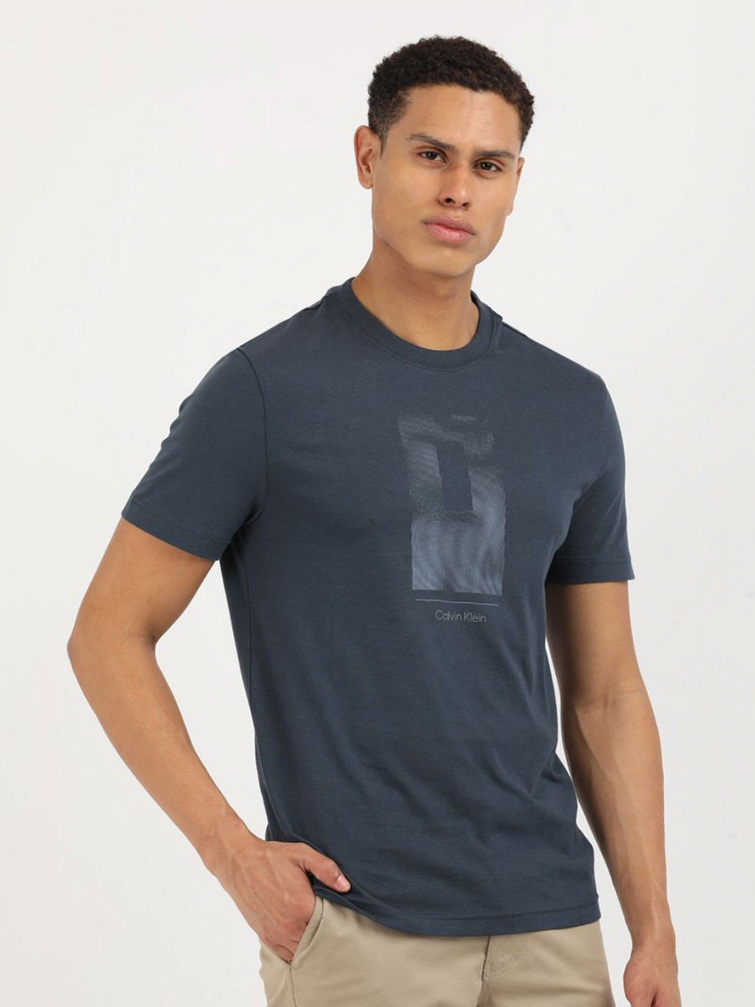 

Calvin Klein Jeans Men Typography Printed Round Neck Cotton T-Shirt, Blue