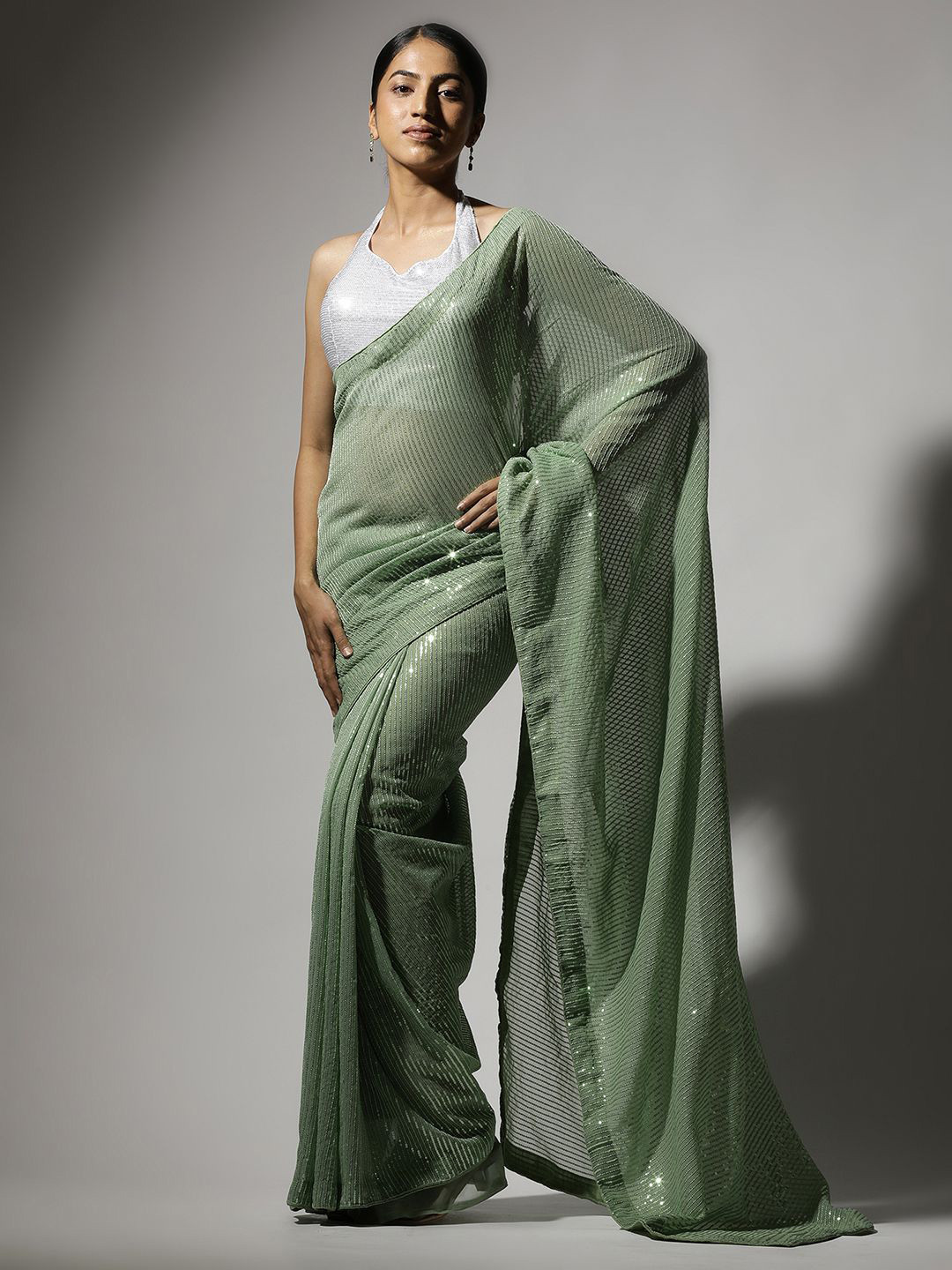 

Qahal Striped Sequinned Pure Georgette Saree, Green
