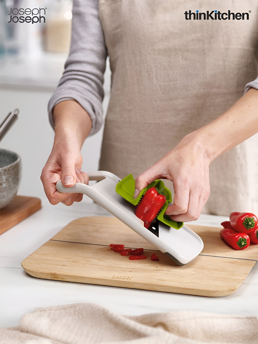 

Joseph Joseph White & Green Slicer With Precision Food Grip