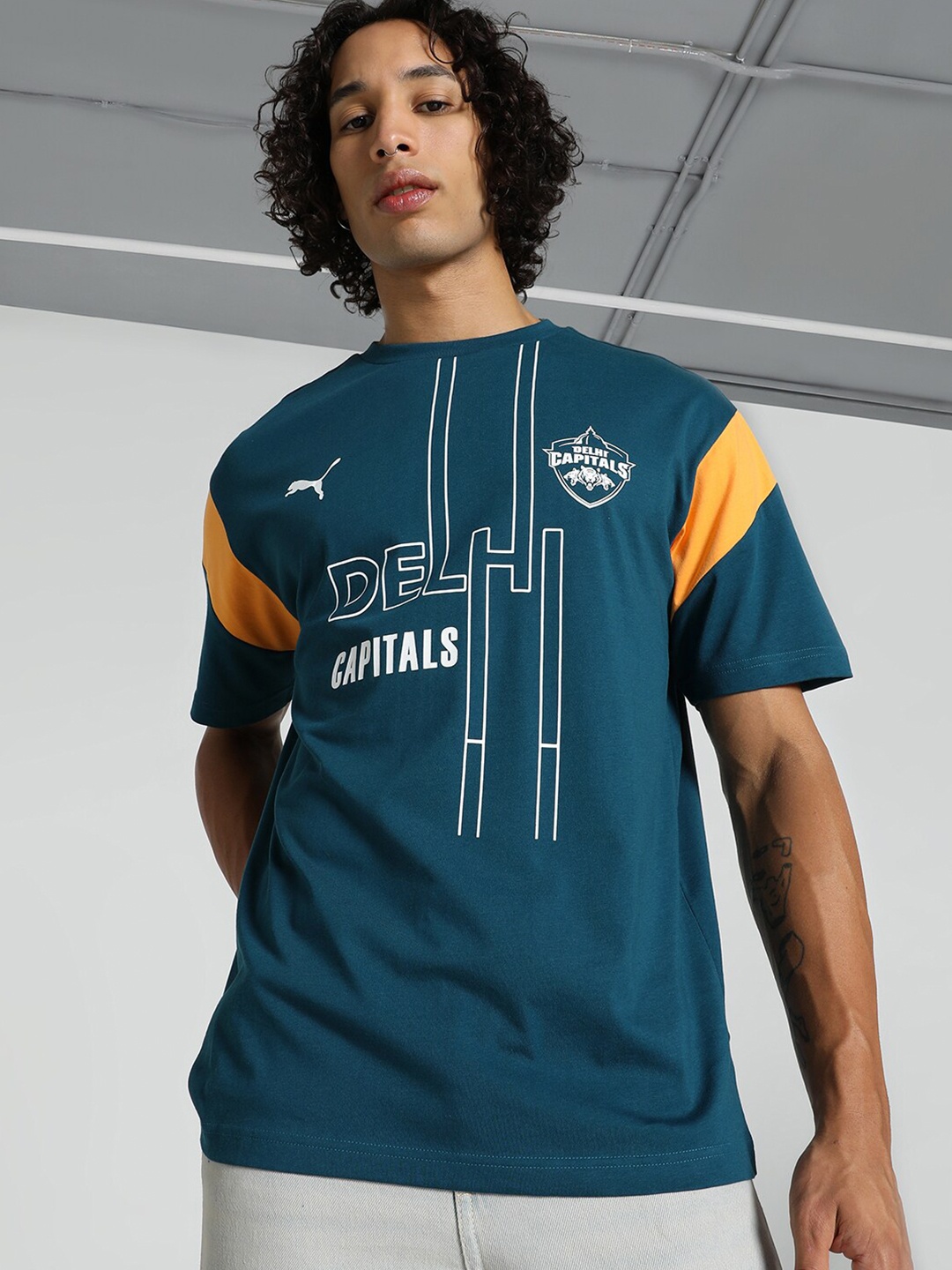 

Puma x DC Graphic Printed Relaxed Fit Cricket Official T-Shirt, Blue