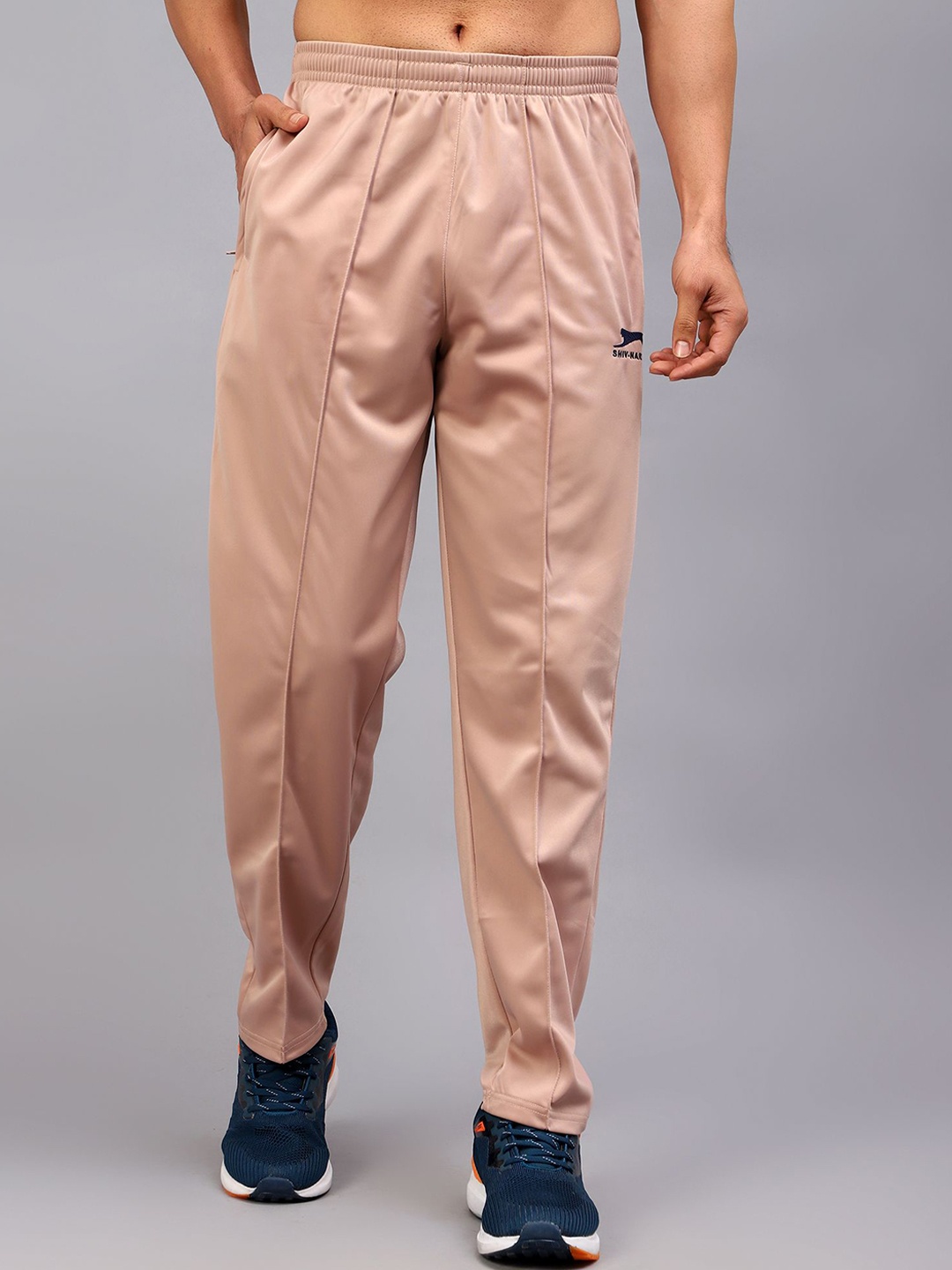 

Shiv Naresh Men Relaxed-Fit Mid Rise Solid Track Pants, Beige
