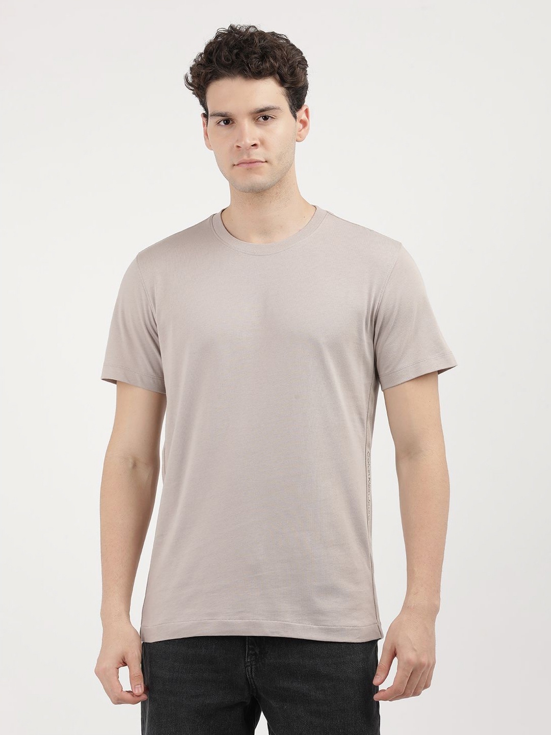 

Calvin Klein Jeans Men Solid Round Neck Cotton T-Shirt, Pink
