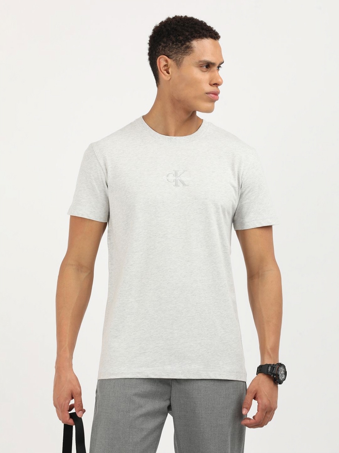 

Calvin Klein Jeans Men Solid Round Neck Cotton T-Shirt, Grey