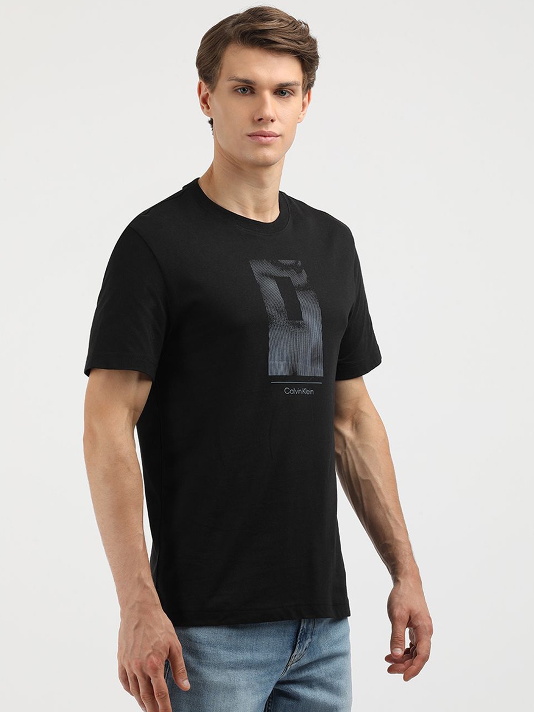 

Calvin Klein Jeans Men Graphic Printed Round Neck Cotton T-Shirt, Black
