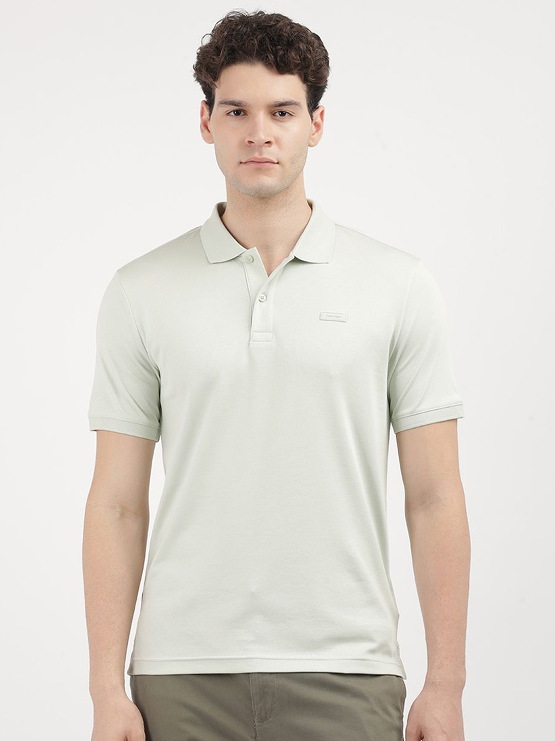 

Calvin Klein Jeans Men Solid Round Neck Cotton Slim Fit T-Shirt, Green