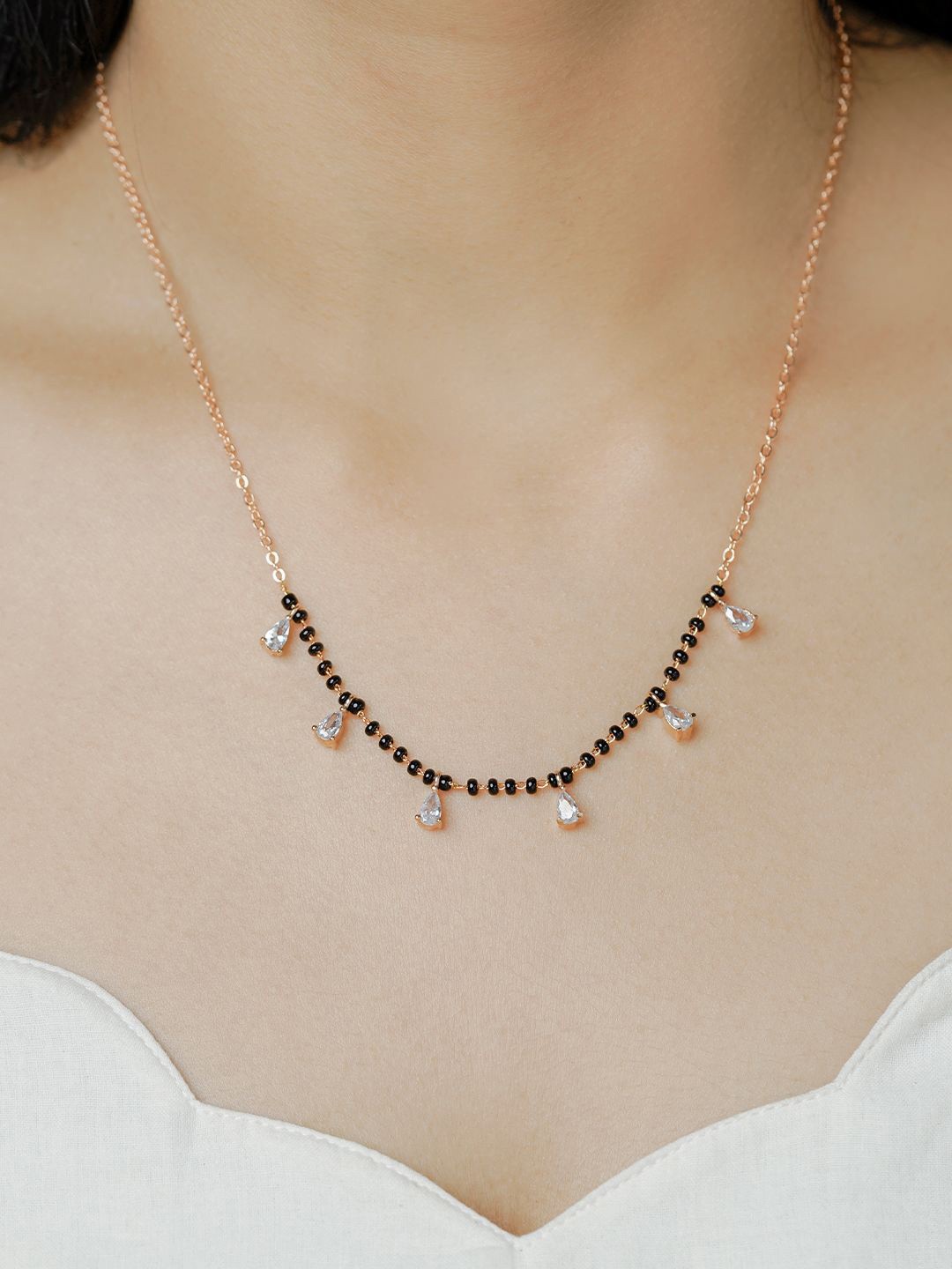 

SWASHAA Stainless Steel Rose Gold Plated Stones Studded & Beaded Mangalsutra