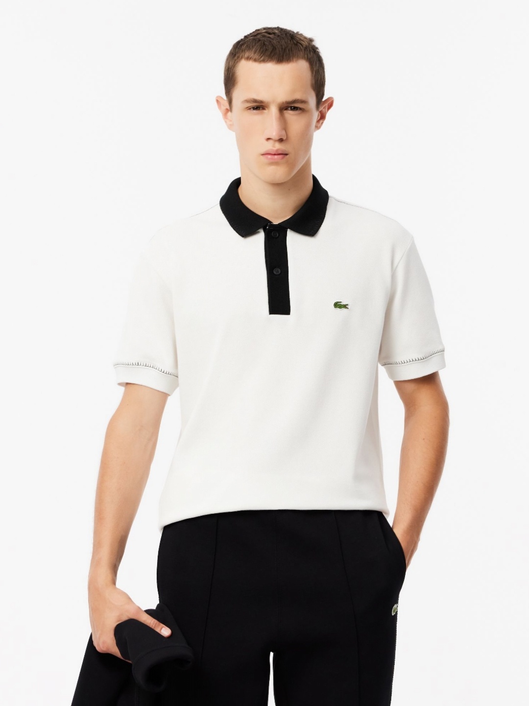 

Lacoste Men Solid Polo Collar Cotton T-Shirt, White