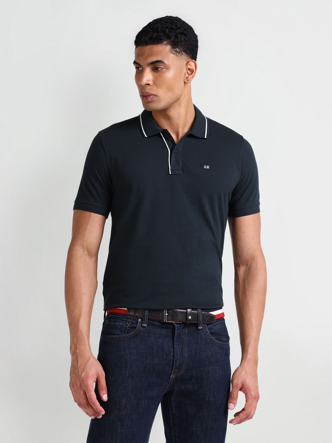 

Arrow Sport Men Solid Polo Collar Cotton T-Shirt, Blue