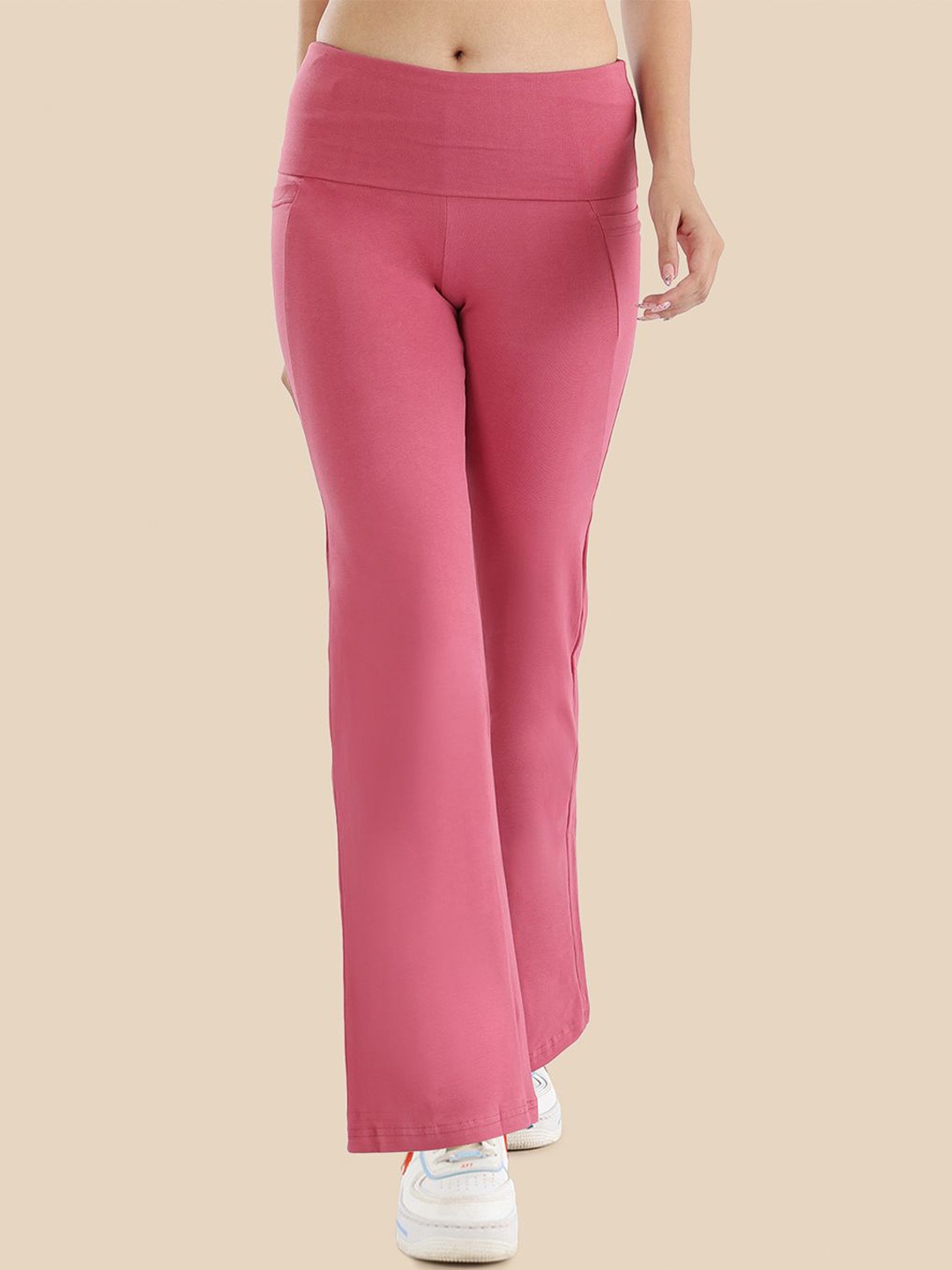

Nite Flite Women Solid Bootcut Mid Rise Track Pants, Pink