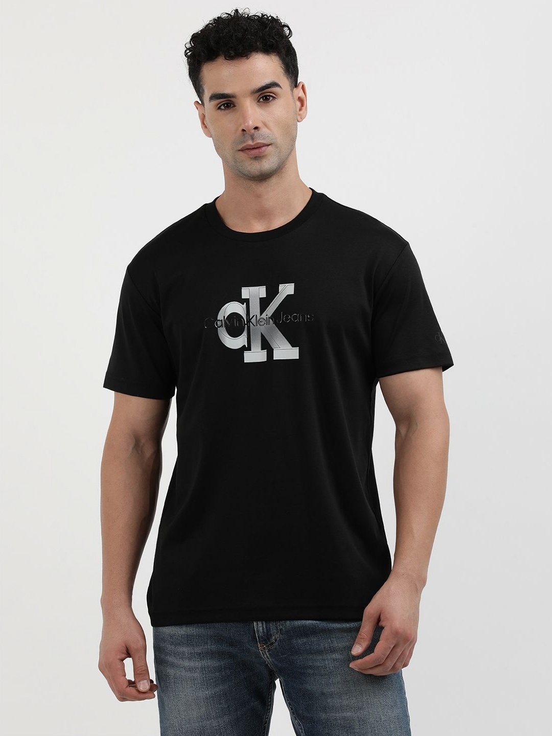 

Calvin Klein Jeans Men Typography Printed Round Neck Cotton T-Shirt, Black