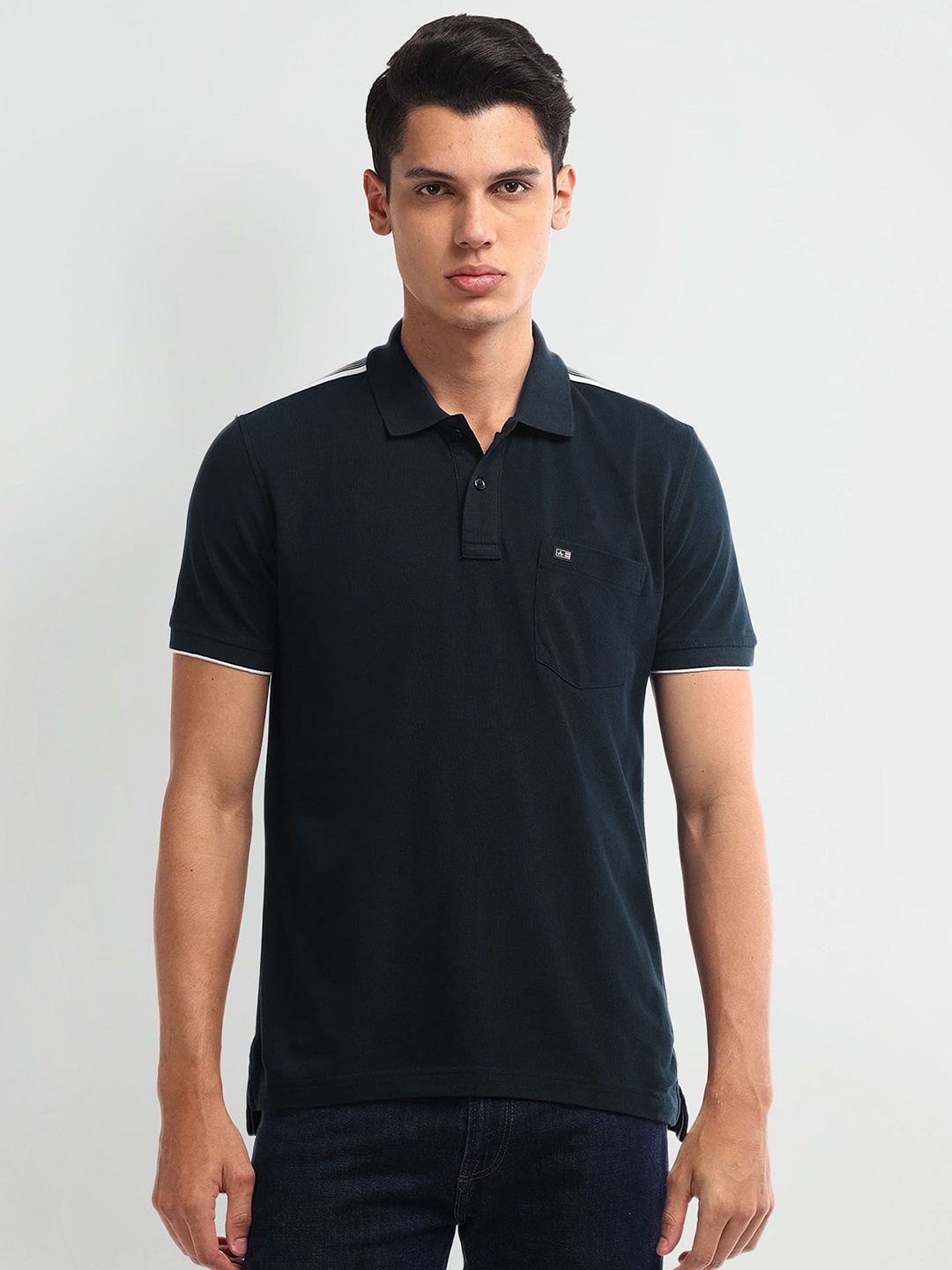 

Arrow Sport Men Solid Polo Collar Cotton T-Shirt, Blue