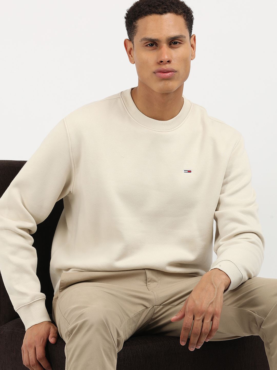 

Tommy Hilfiger Men Solid Round Neck Sweatshirt, Beige