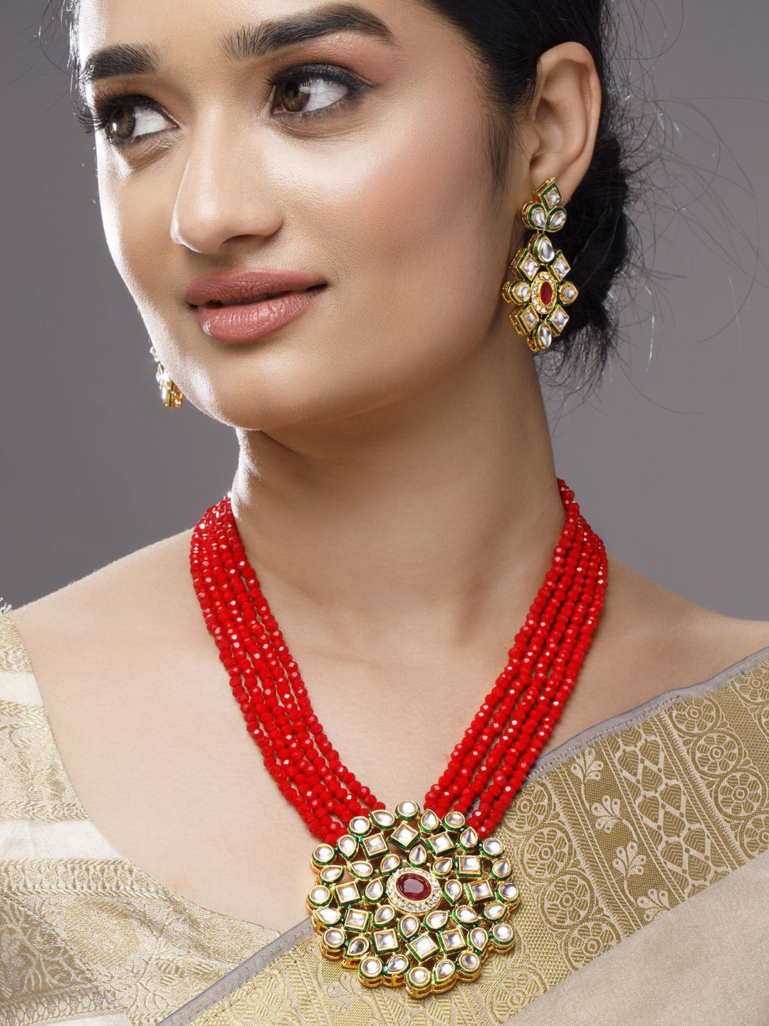 

Rubans 22K Gold-Plated Kundan-Studded Red Beaded Necklace Set with Green and Red Accents