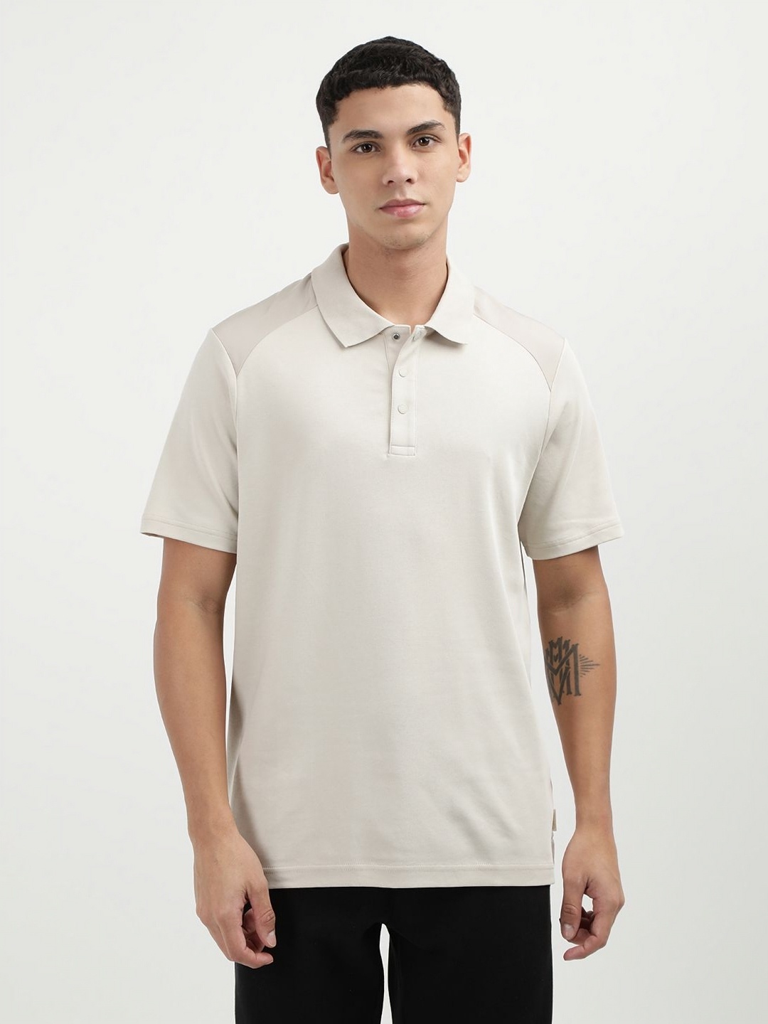 

Calvin Klein Jeans Men Solid Polo Collar Cotton T-Shirt, Beige