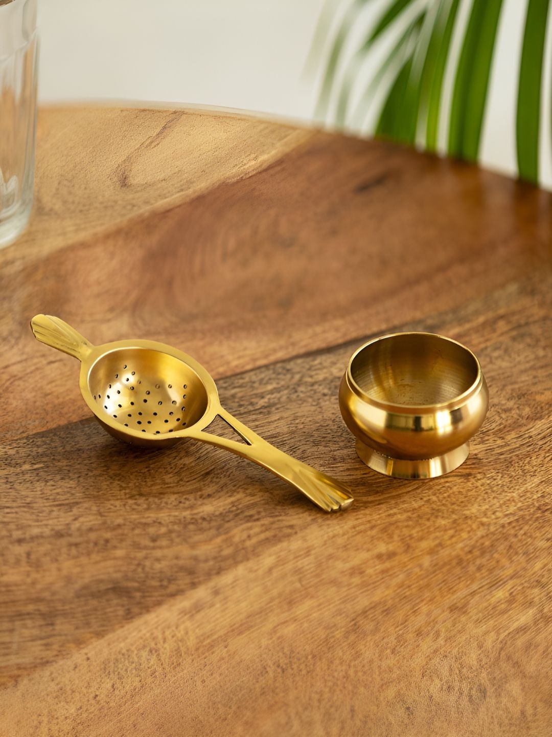 

ExclusiveLane Uttam Gold Toned 2 Pieces Brass Tea Strainer With Holder