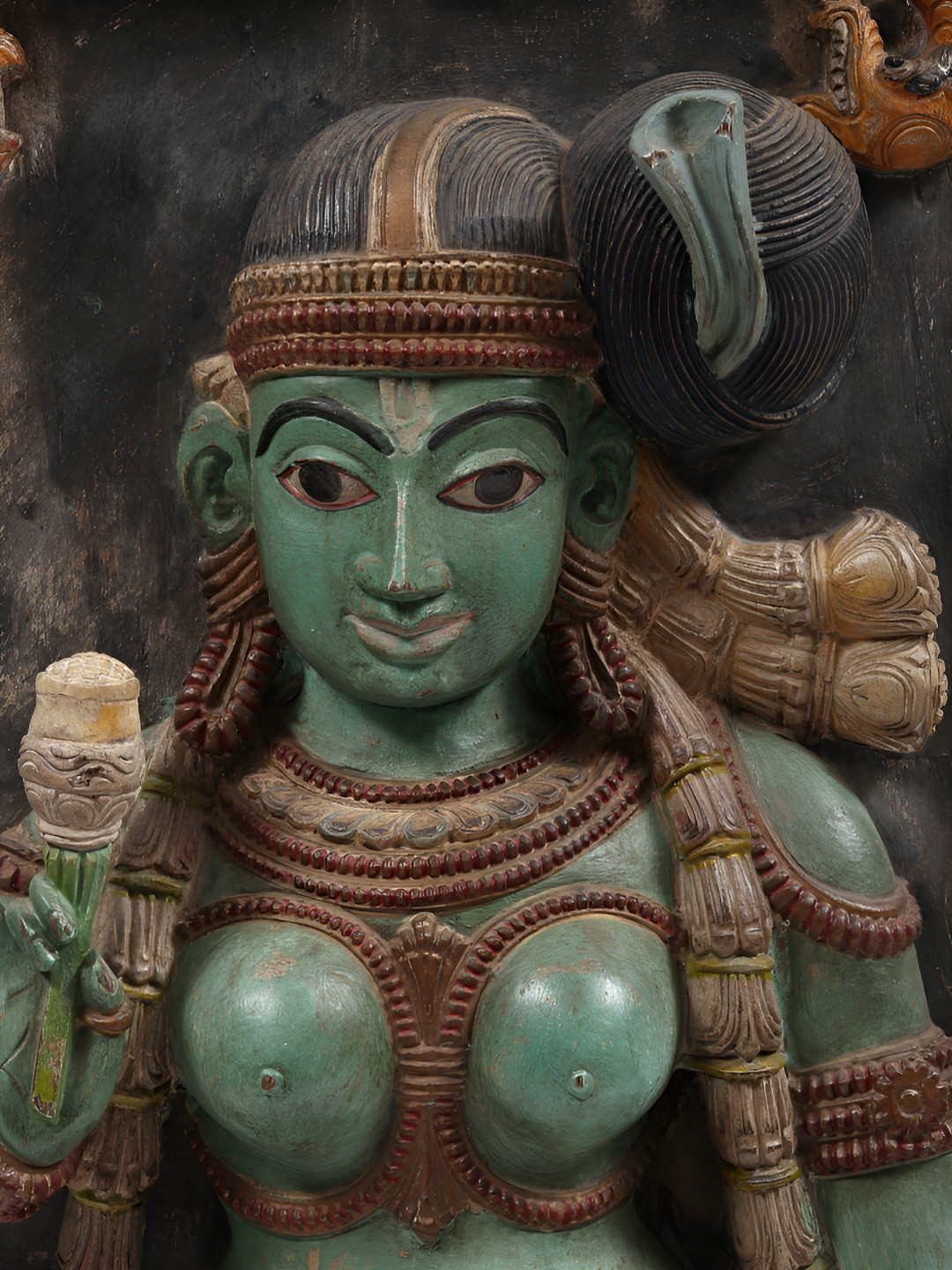 

Exotic India Teal & Pink Wooden Nambudiri Brahmin Lady Showpiece