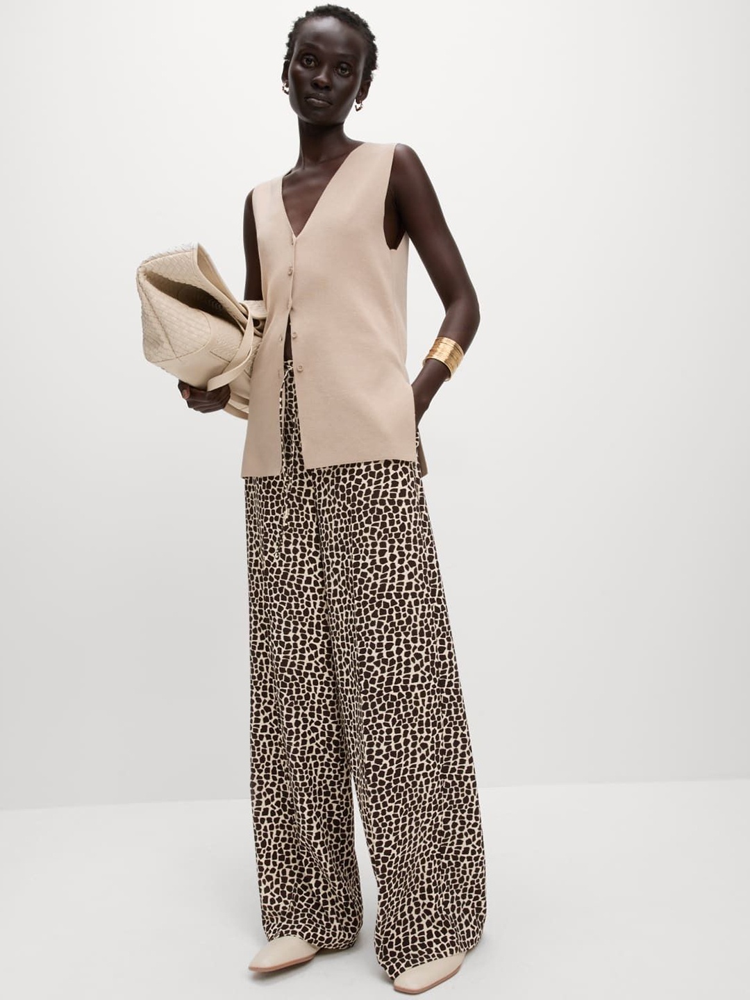 

Marks & Spencer Women Animal Printed Flared High-Rise Trousers, Black