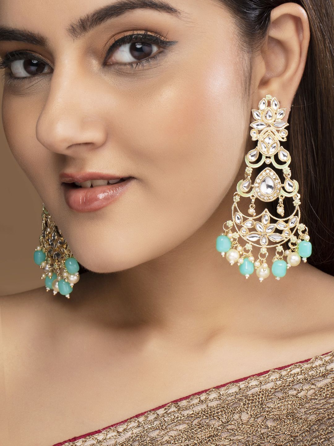 

Rubans 22K Gold-Plated Kundan Studded Chandelier Earring with Aqua Blue Beads & Pearl Drop