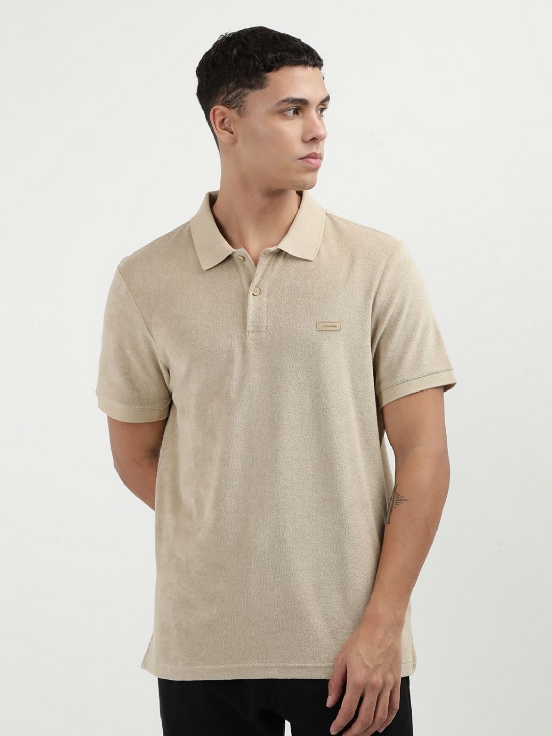 

Calvin Klein Jeans Men Solid Polo Collar Organic Cotton T-Shirt, Khaki