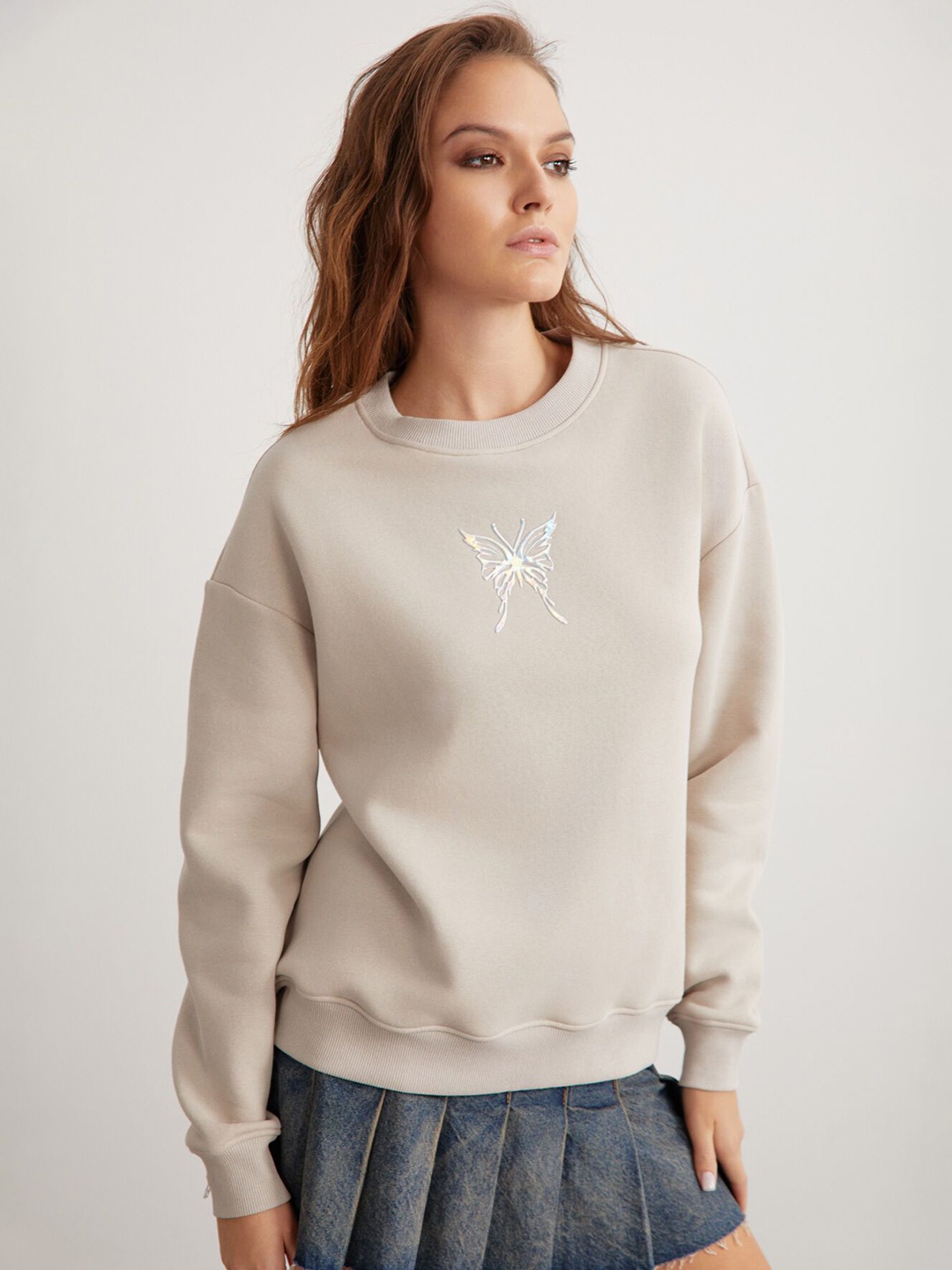 

GRIMELANGE Women Solid Round Neck Sweatshirt, Beige
