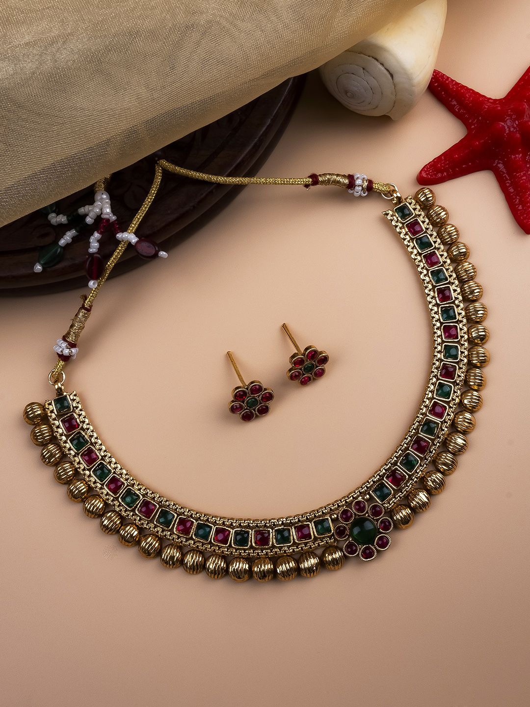 

StileAdda Gold Plated Ruby Stone Studded Jewellery Set