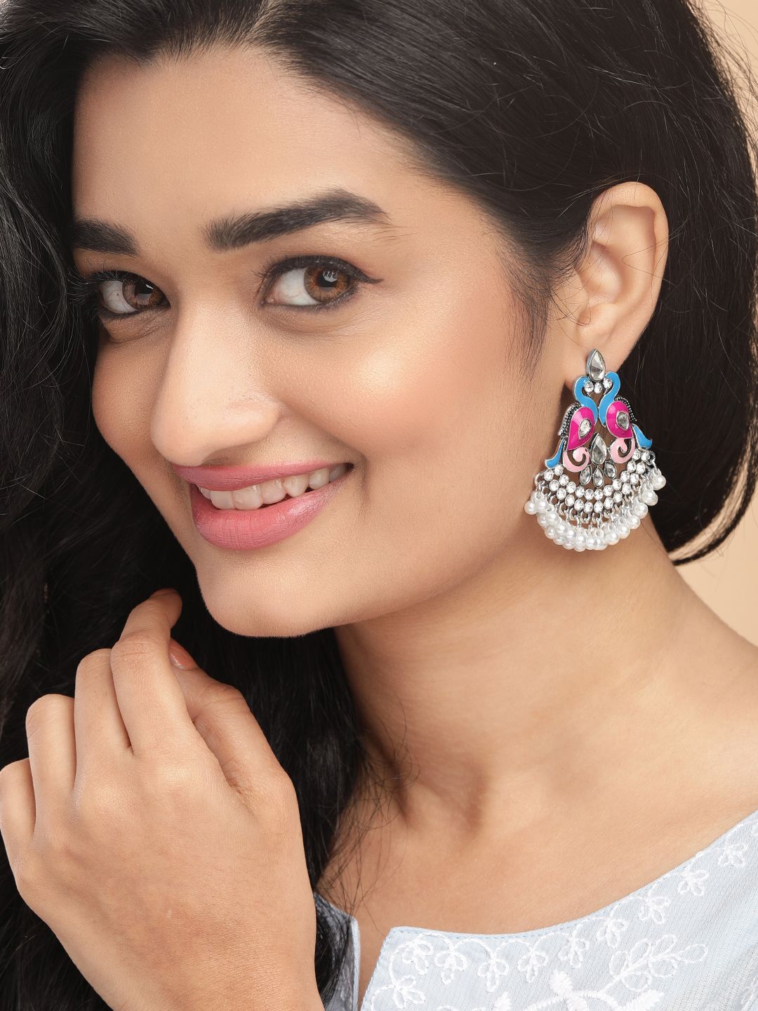 

Rubans Silver-Plated Oxidized Stone Studded & Beaded Peacock Shaped Chandbalis
