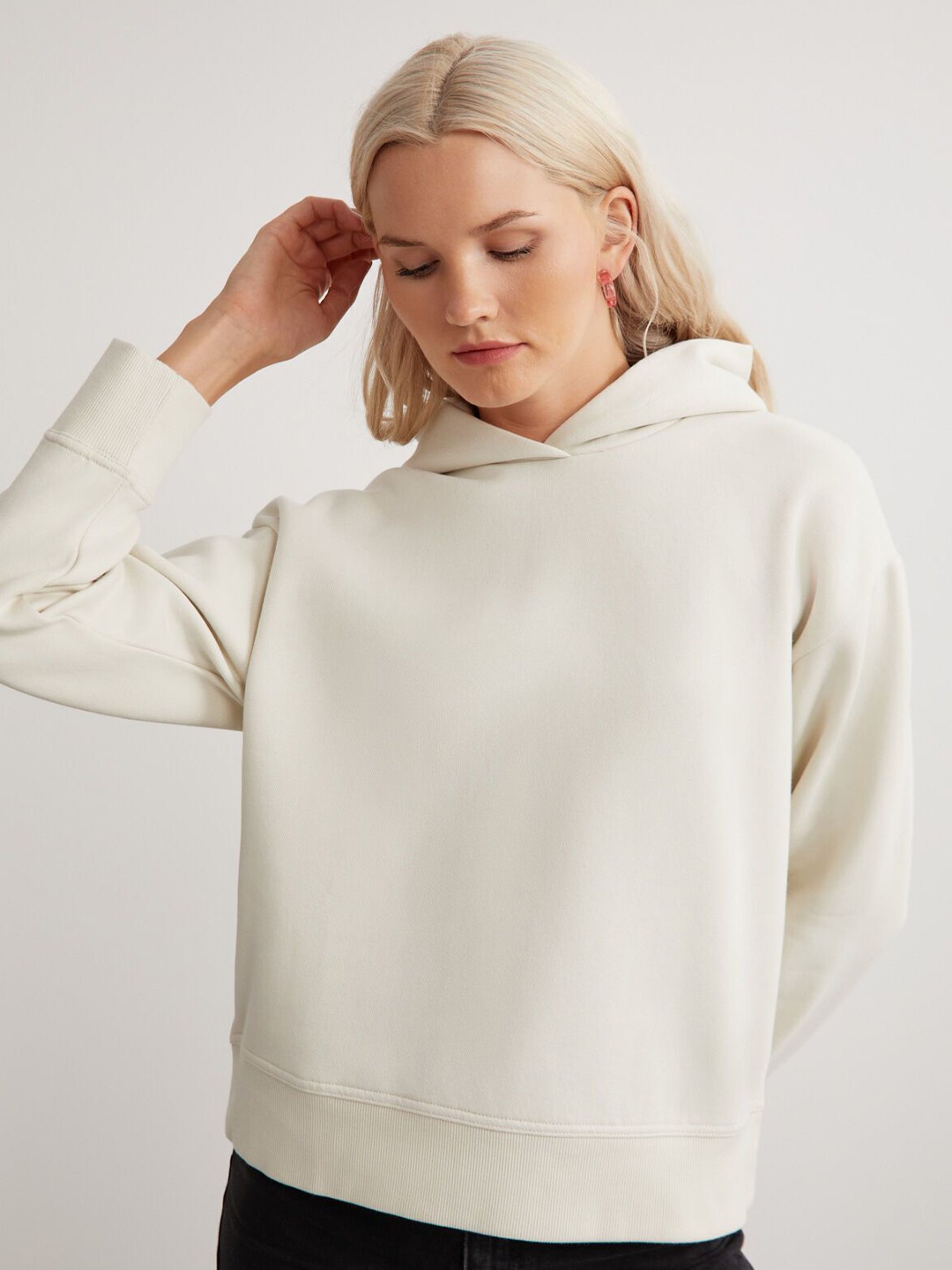 

GRIMELANGE Women Solid Hooded Sweatshirt, Cream