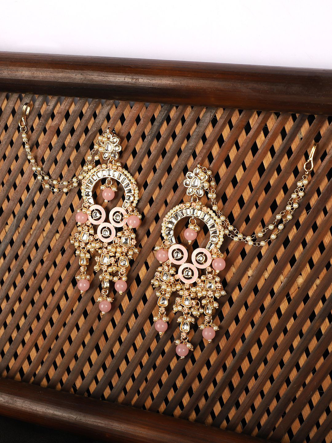 

Anouk Pink Gold Plated Kundan and Pearls Drop Earrings With Ear Chain