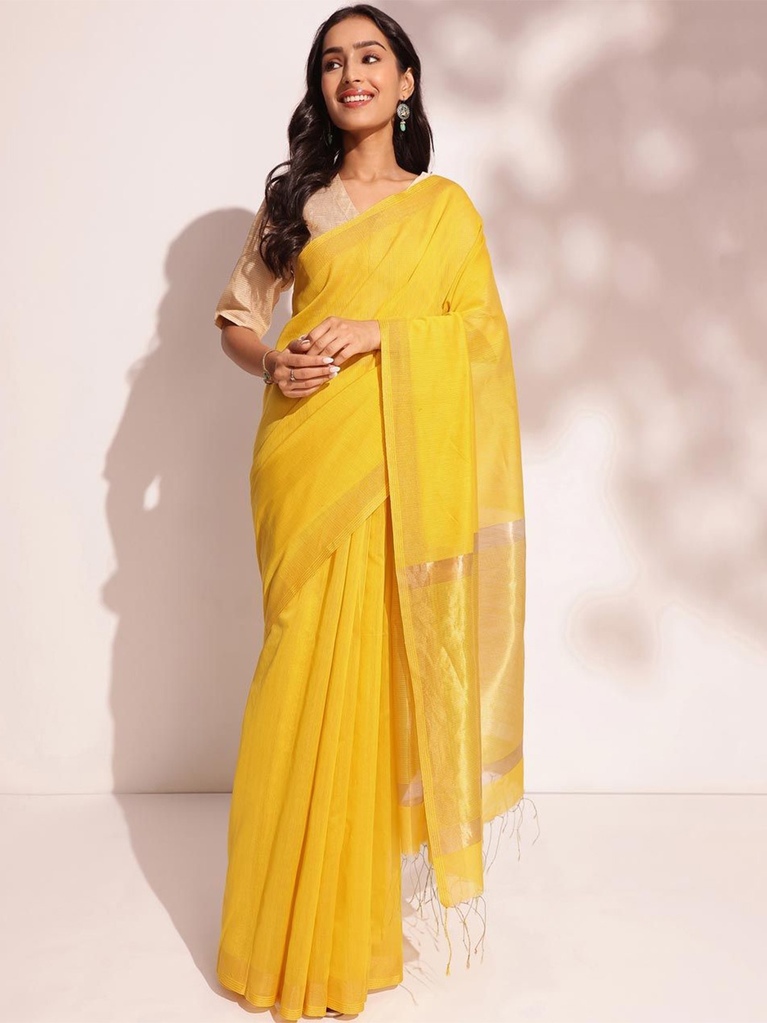 

Fabindia Solid Silk Cotton Saree, Yellow