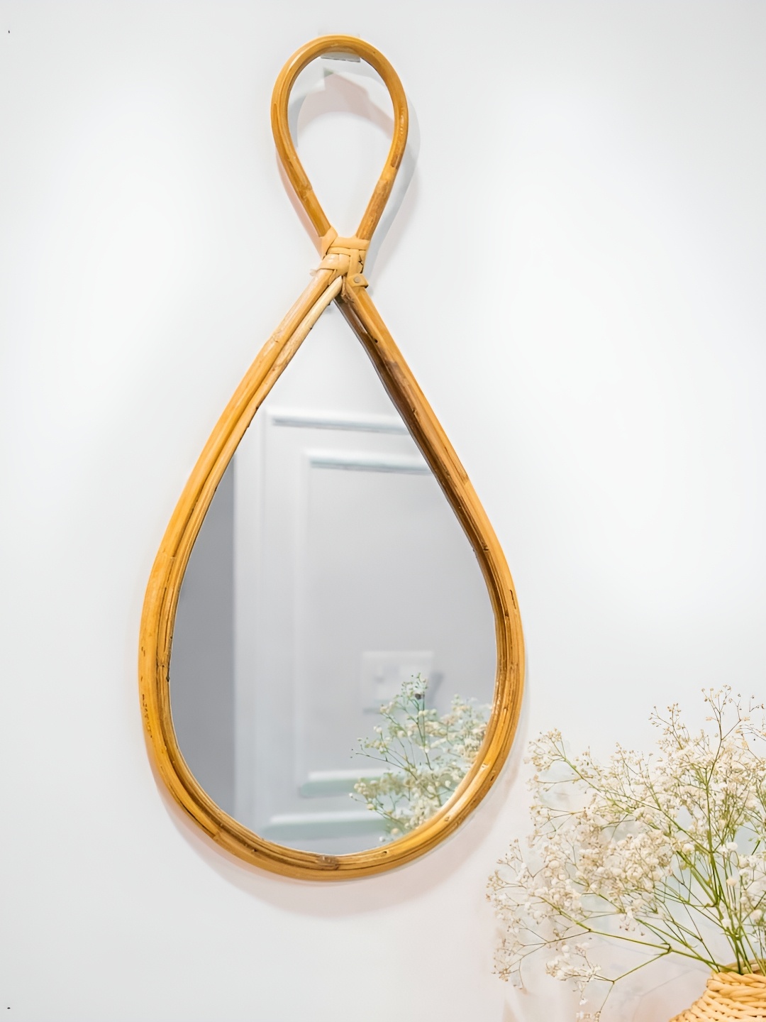 

AJAARA Beige Aadikrit Rattan Droplet Wall Mirror