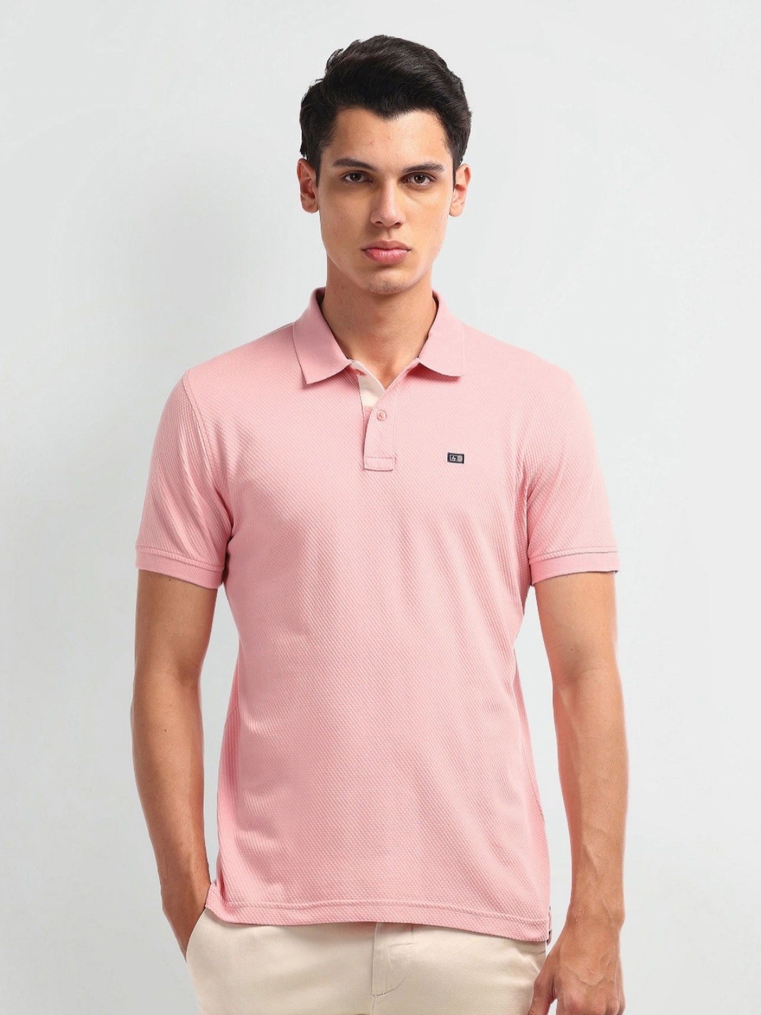 

Arrow Sport Men Solid Polo Collar Cotton T-Shirt, Pink