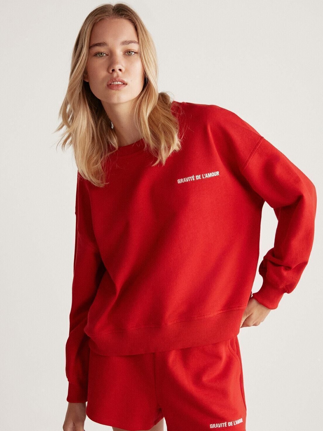 

GRIMELANGE Women Solid Round Neck Sweatshirt, Red