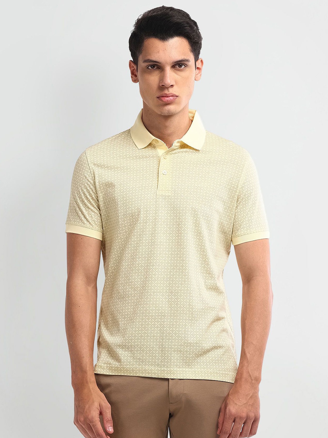 

Arrow Men Geometric Printed Polo Collar Cotton T-Shirt, Yellow