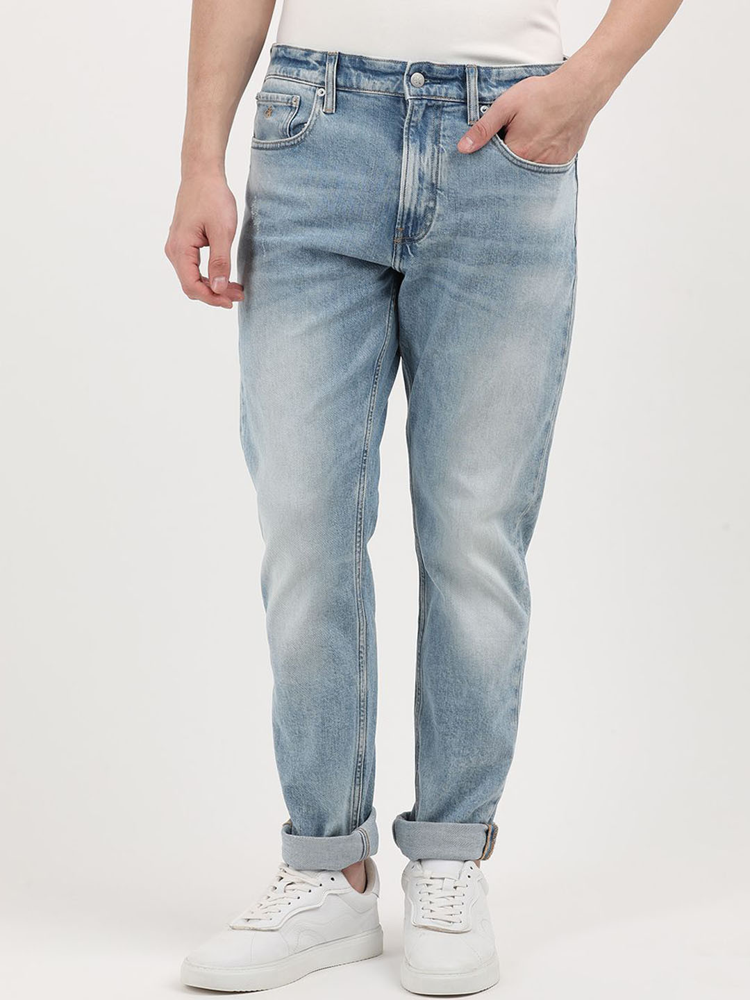 

Calvin Klein Jeans Men Slim Fit Mid-Rise Heavy Fade Jeans, Blue