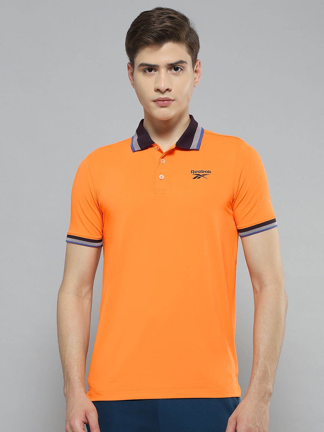 

Reebok Slim Fit Neo Jaquard Collar T-shirt, Orange