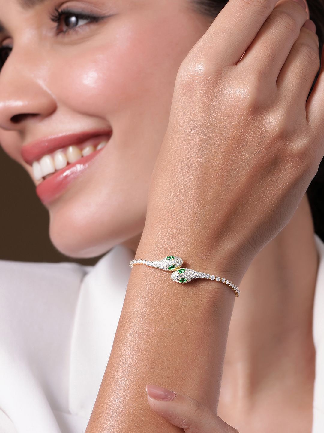 

Rubans 18K Gold Plated Emerald & Cubic Zirconia Studded Snake Design Bracelet