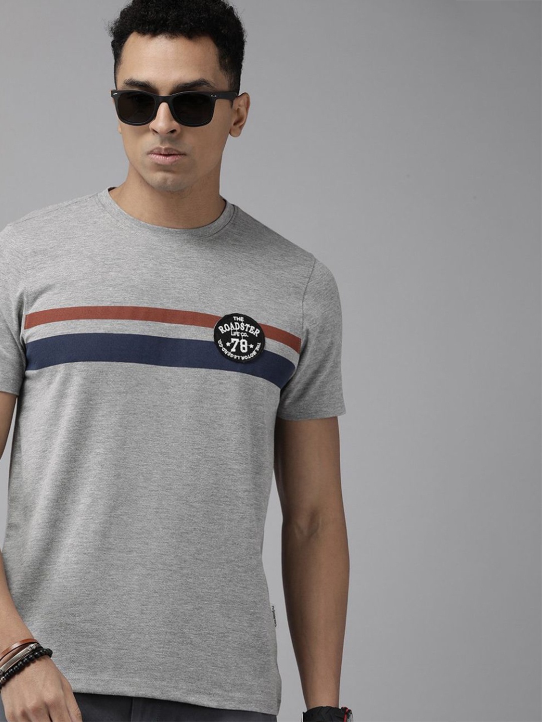 

The Roadster Lifestyle Co. Men Striped Round Neck Cotton T-shirt, Grey melange