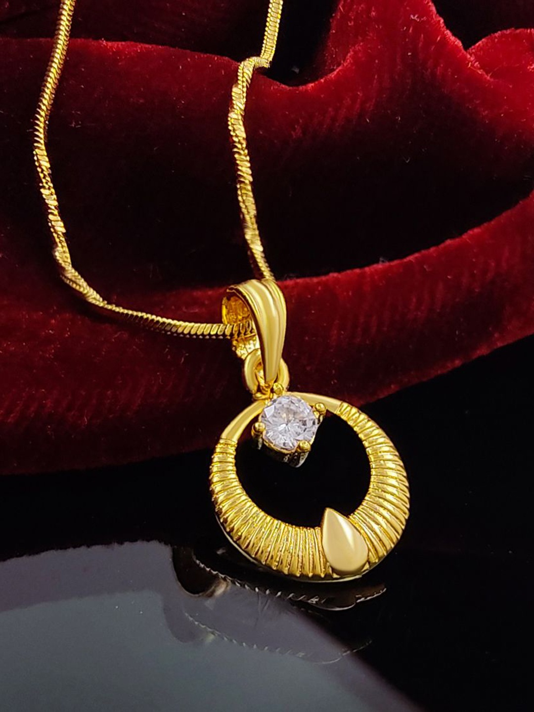 

Saizen Gold-Plated Stone Studded Circular Pendant With Chain