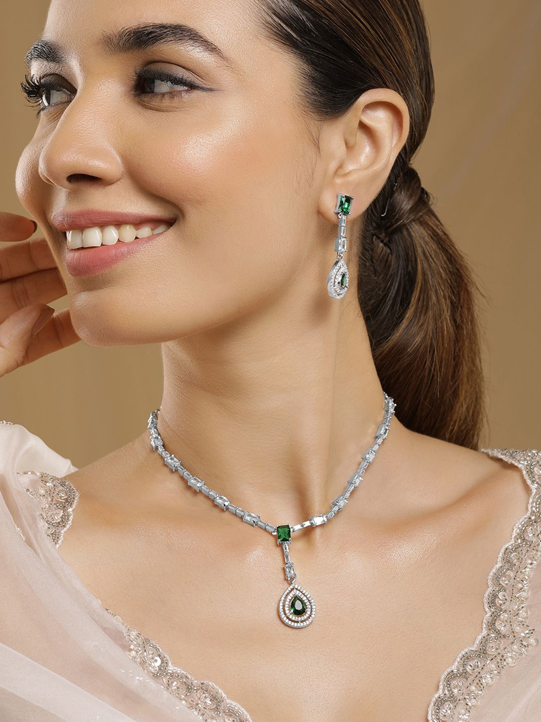 

Rubans Rhodium Plated Emerald Teardrop Pendant Necklace Set with AD & CubicZirconia Studed, Silver