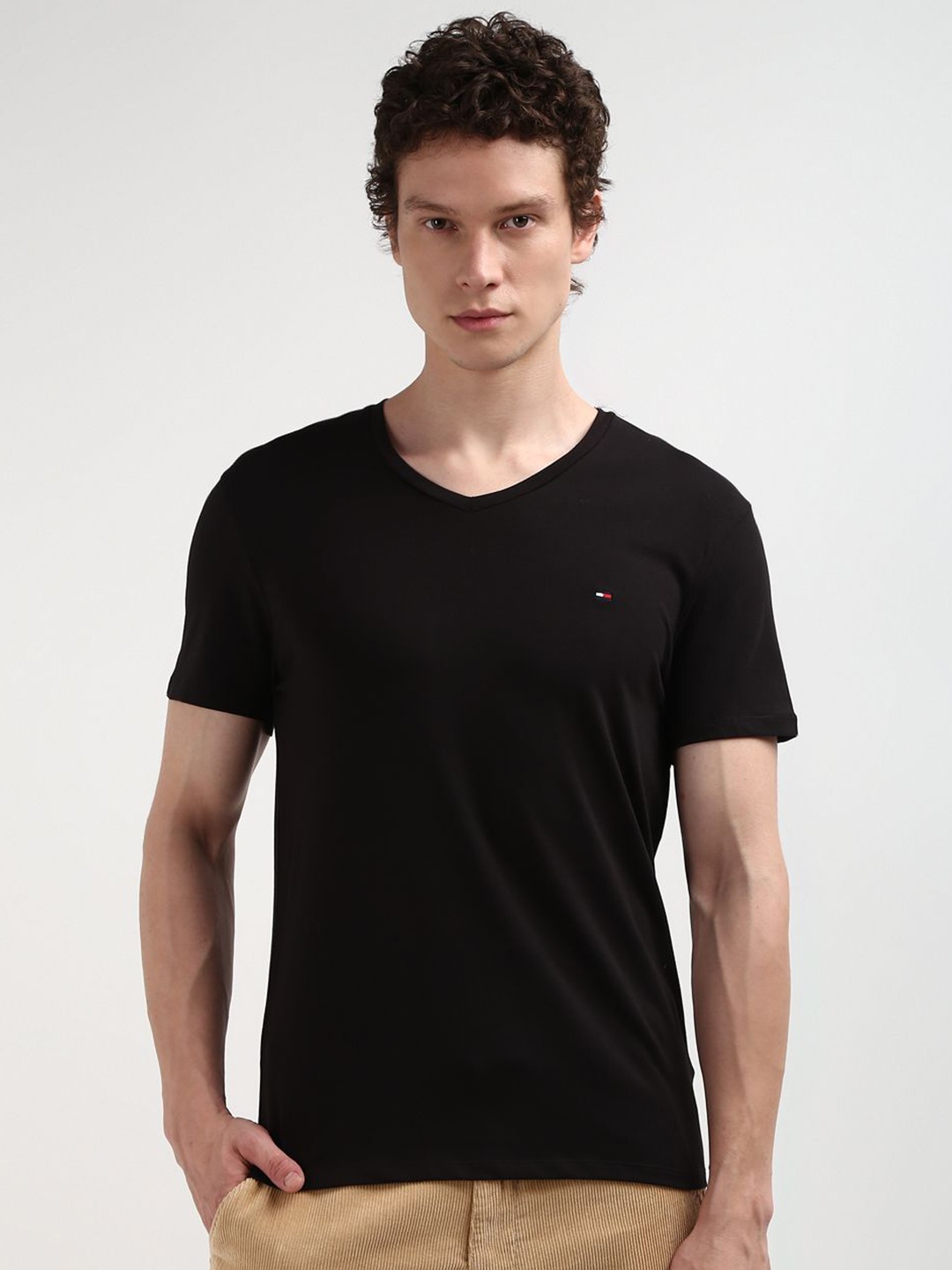 

Tommy Hilfiger Men Solid Pure Cotton V-Neck Slim Fit T-shirt, Black
