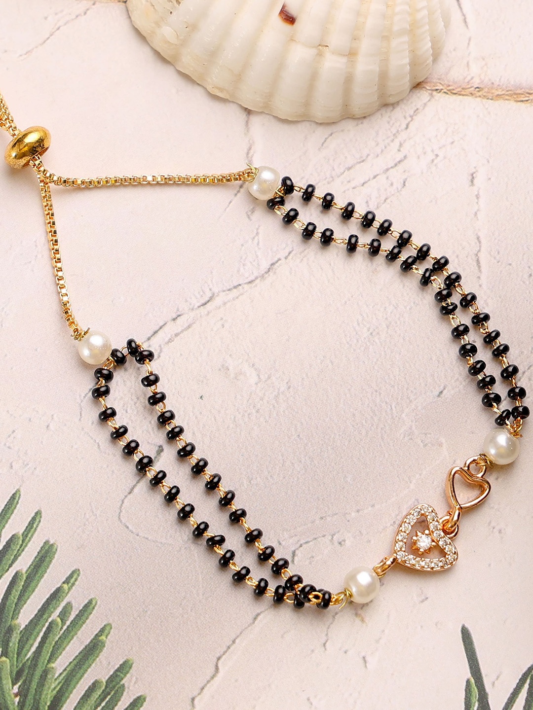 

Mali Fionna Gold-Plated Stones Studded and Beaded Heart Shaped Mangalsutra Bracelet