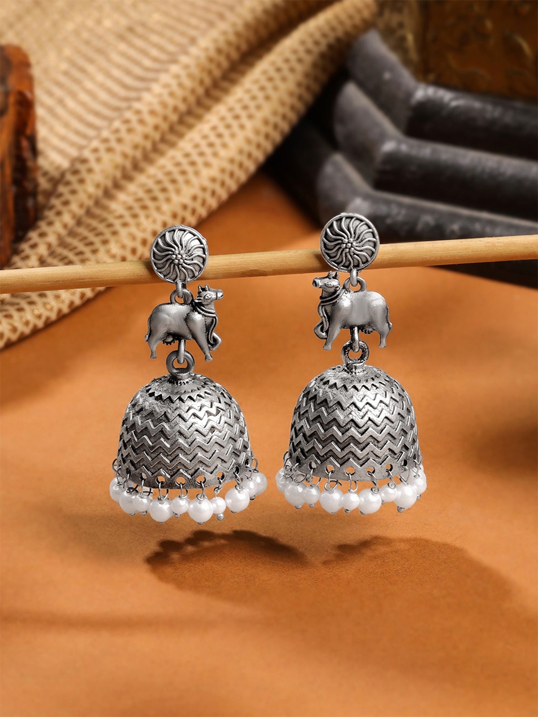 

Yellow Chimes Oxidised Silver-Plated Dome Shaped Jhumkas