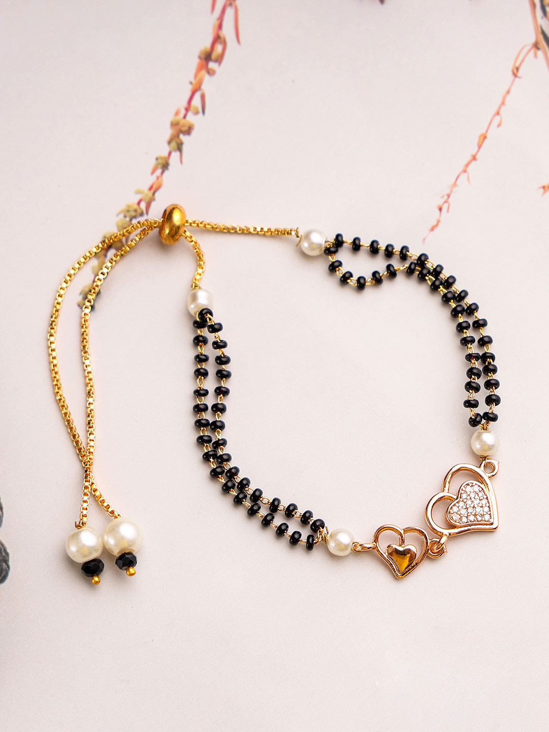 

Mali Fionna Gold-Plated Stones Studded and Beaded Heart Shaped Mangalsutra Bracelet