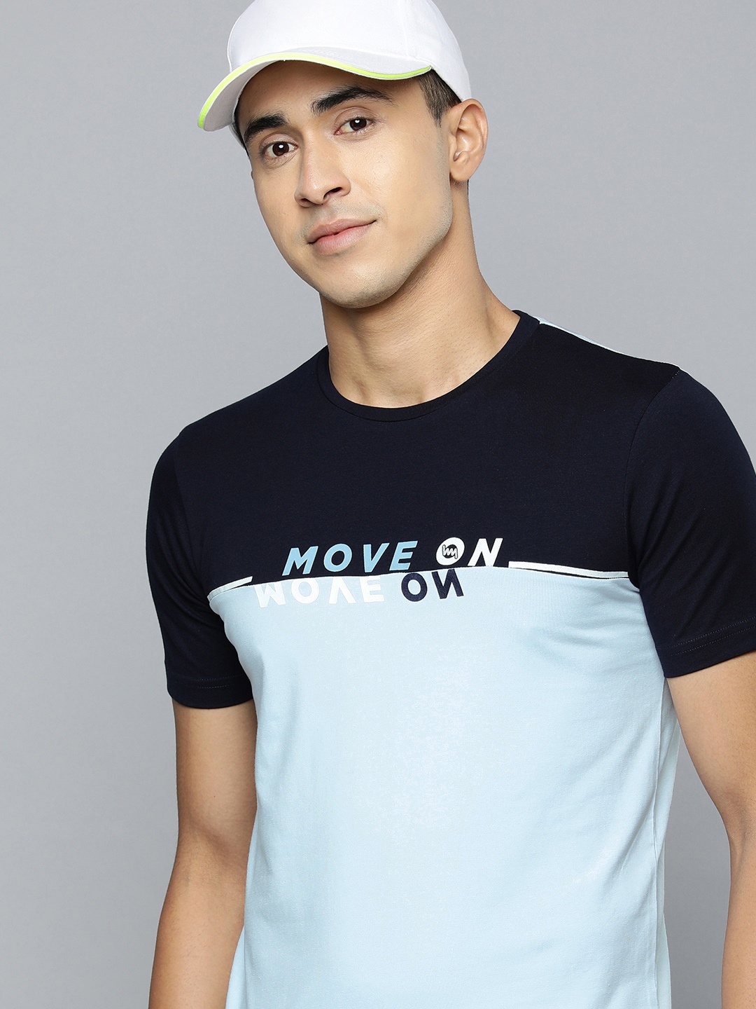 

Lawman pg3 Men Turquoise Blue & Navy Blue Colourblocked Slim Fit T-shirt