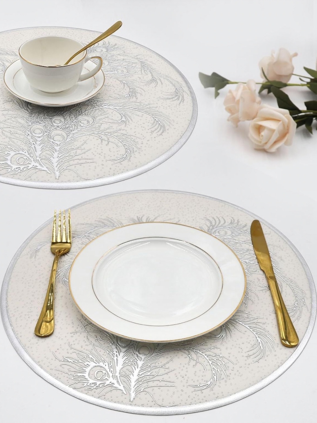 

Dakshya Industries Silver Toned & White 2 Pieces Floral Textured Round Table Placemats