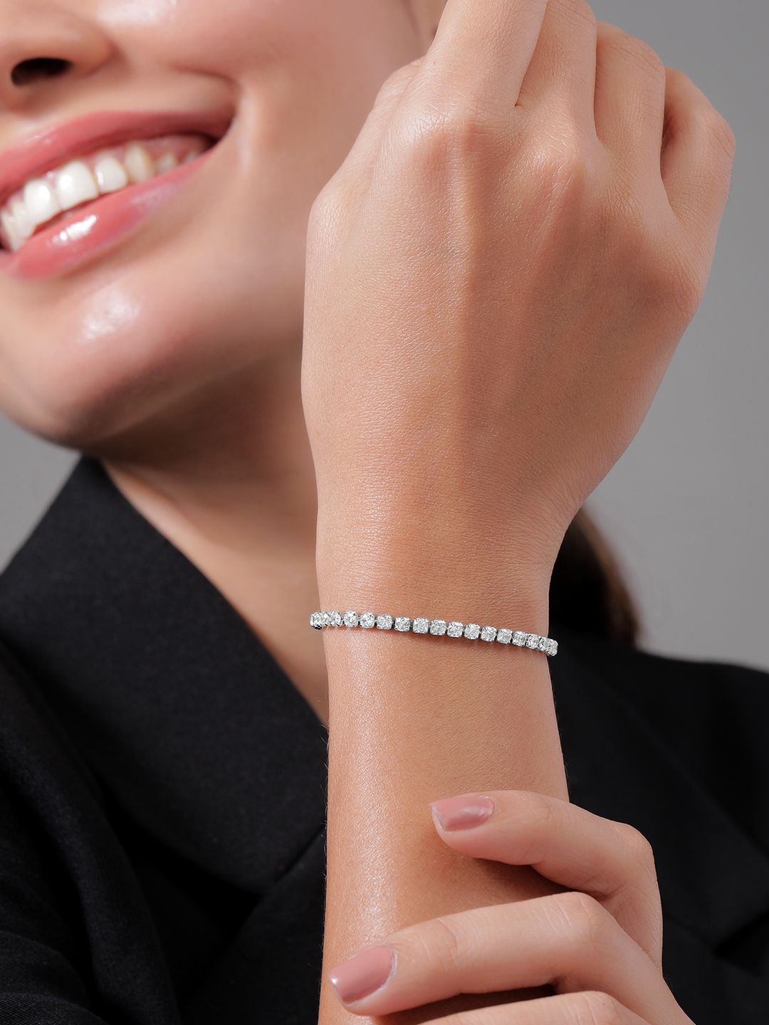 

Rubans Rhodium Plated Cubic Zirconia Studded Tennis Bracelet, Silver