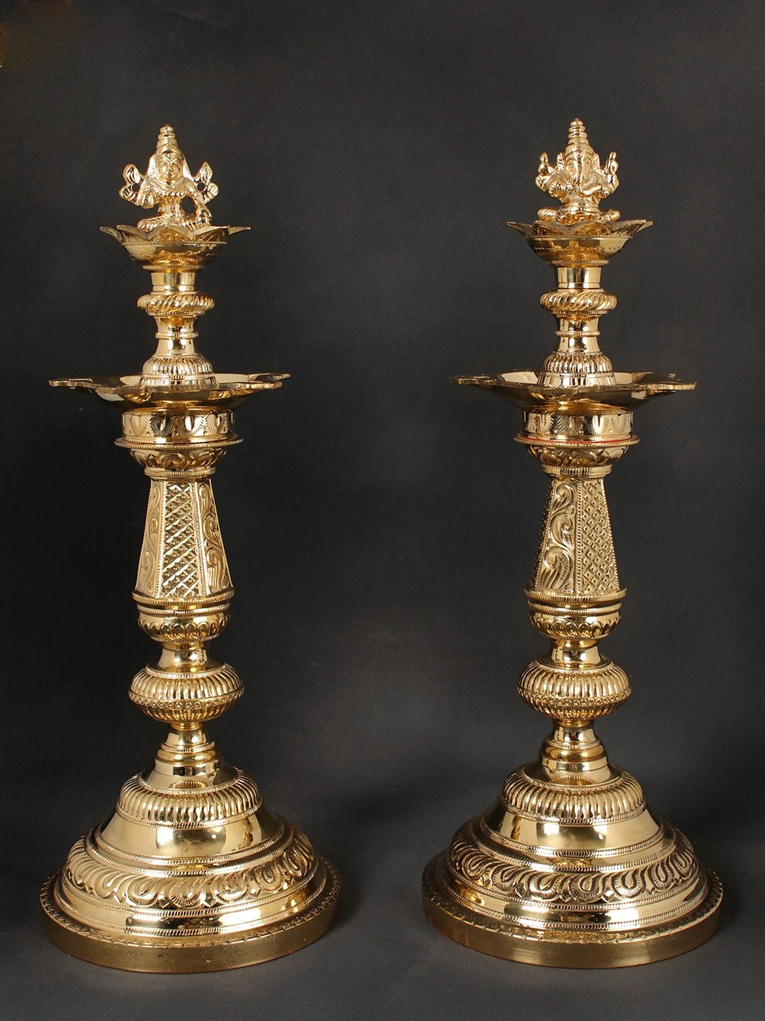 

Exotic India 16" Lord Ganesha and Goddess Lakshmi Pair of Lamps, Gold