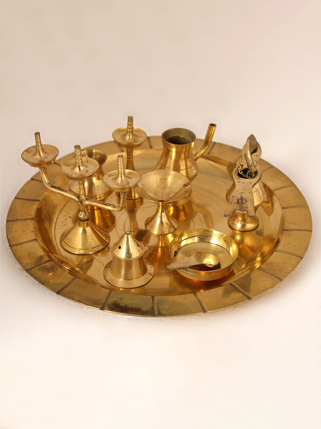 

Exotic India Gold-Toned 9 Pieces Brass Pooja Ashta Mangalam Thali
