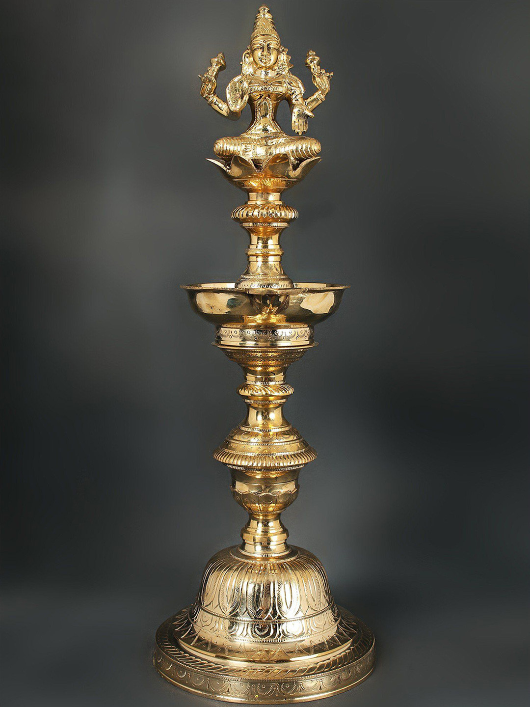 

Exotic India Gold Toned Textured Brass Pooja Diya