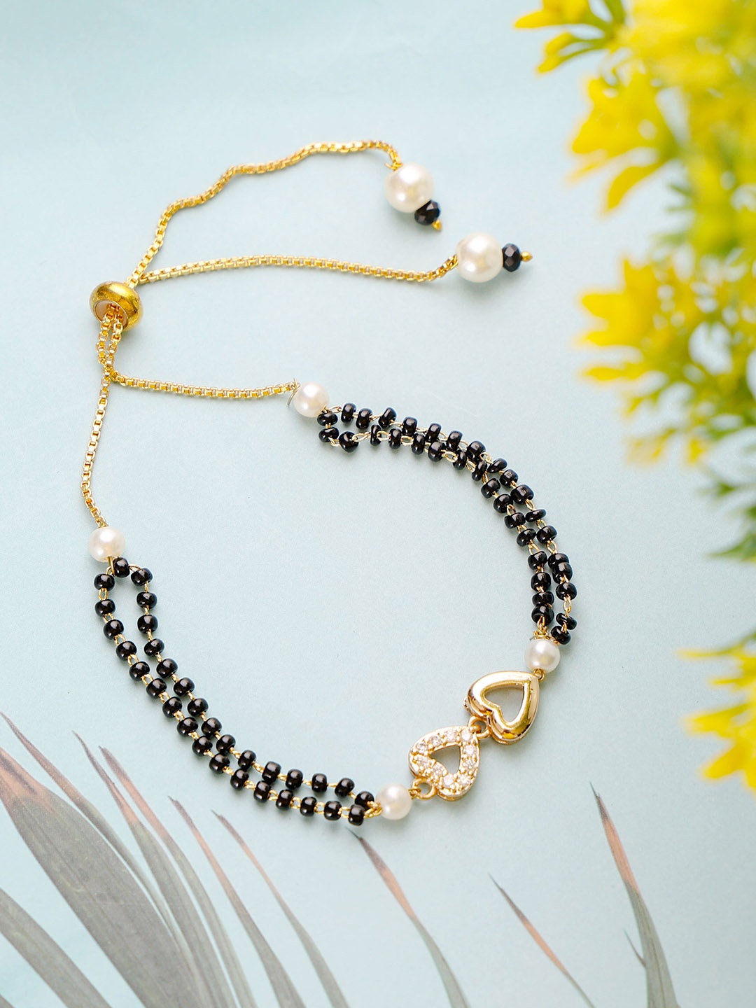 

Mali Fionna Gold-Plated Stones Studded and Beaded Heart Shaped Mangalsutra Bracelet